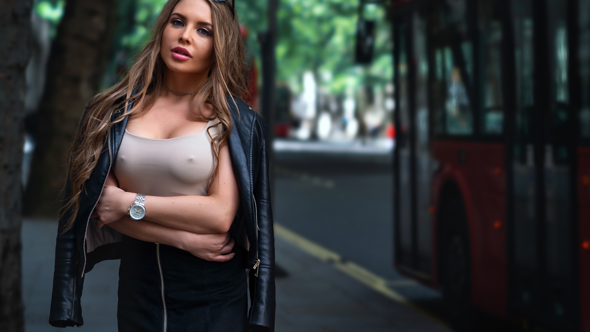 women, trees, buses, arms crossed, sunglasses, nipples through clothing, watch, leather jackets, pink lipstick, portrait