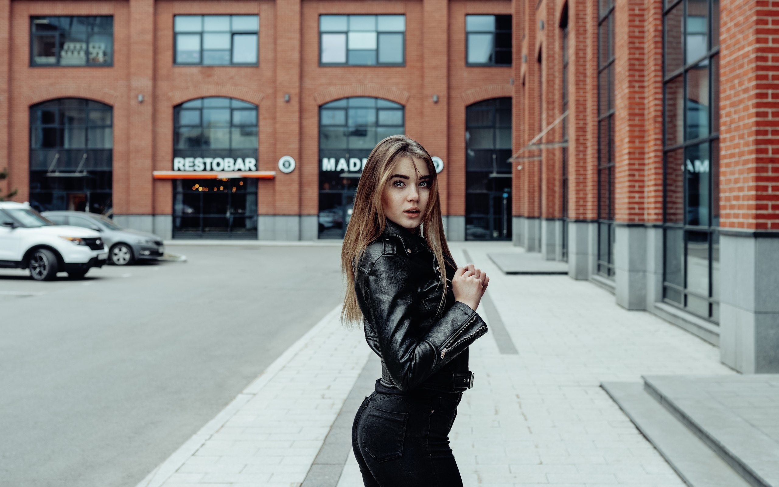 women, jeans, leather jackets, portrait, women outdoors, car, bricks, black clothing, gray eyes