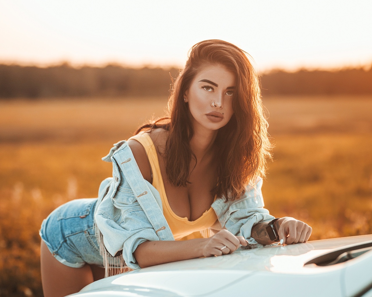 women, brunette, women outdoors, women with cars, tattoo, denim, tank top, jean shorts, sunset, nose ring, piercing, watch, juicy lips