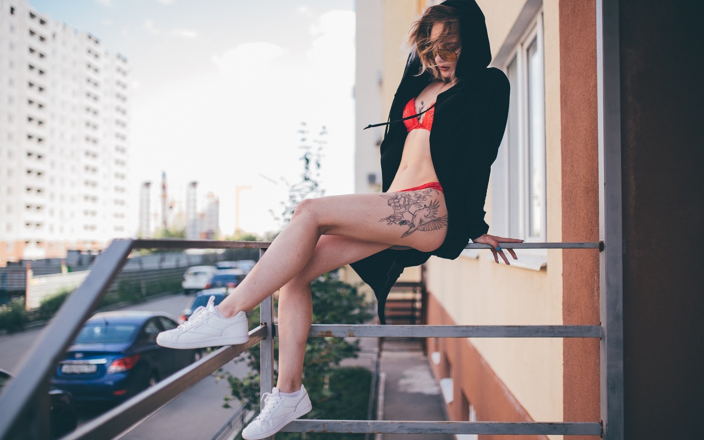 women, tattoo, black sweater, red lingerie, women outdoors, building, sneakers, ass, hoods, sunglasses, belly, sitting, painted nails