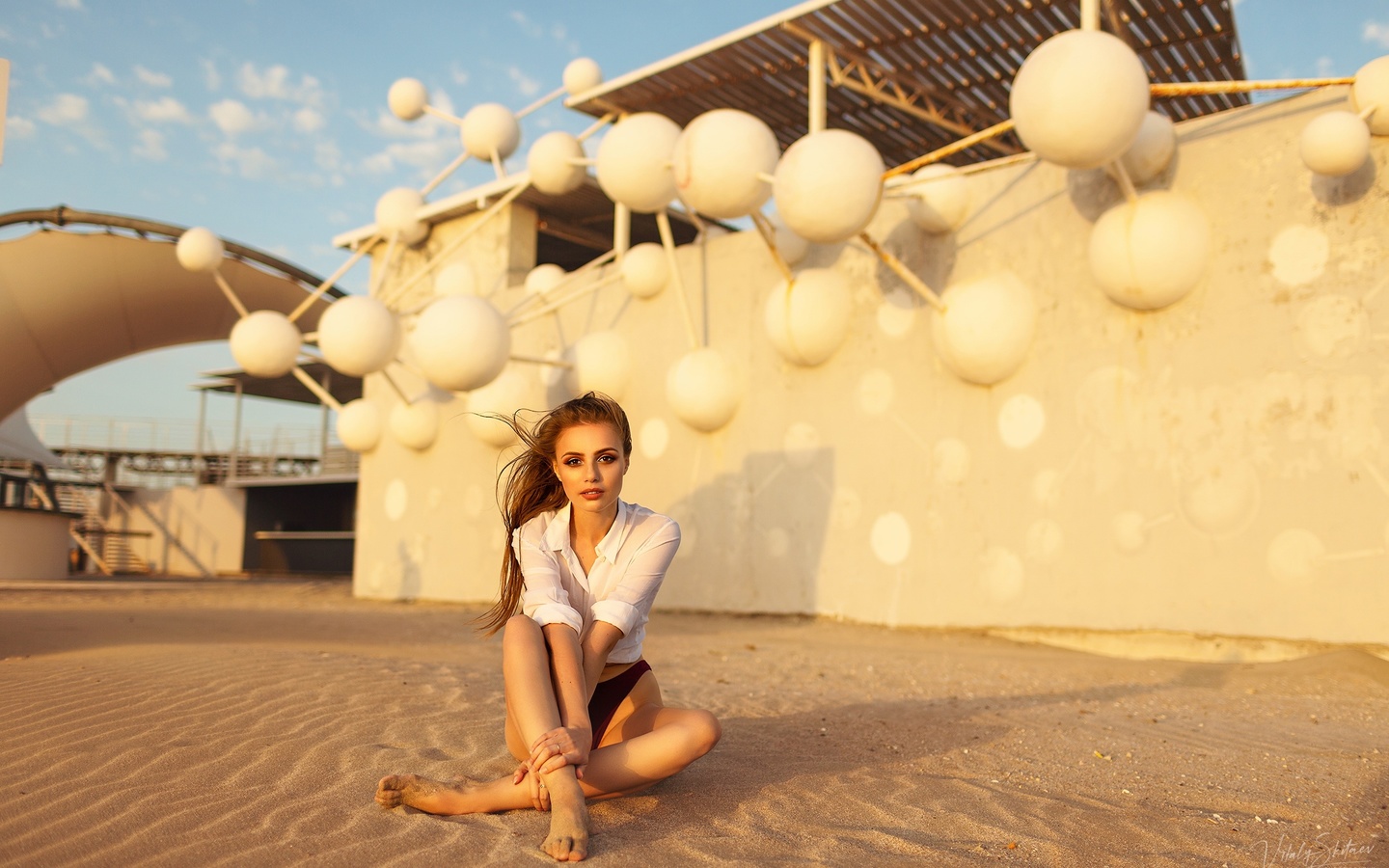 women, brunette, sitting, sand, white shirt, long hair, women outdoors, vitaly skitaev