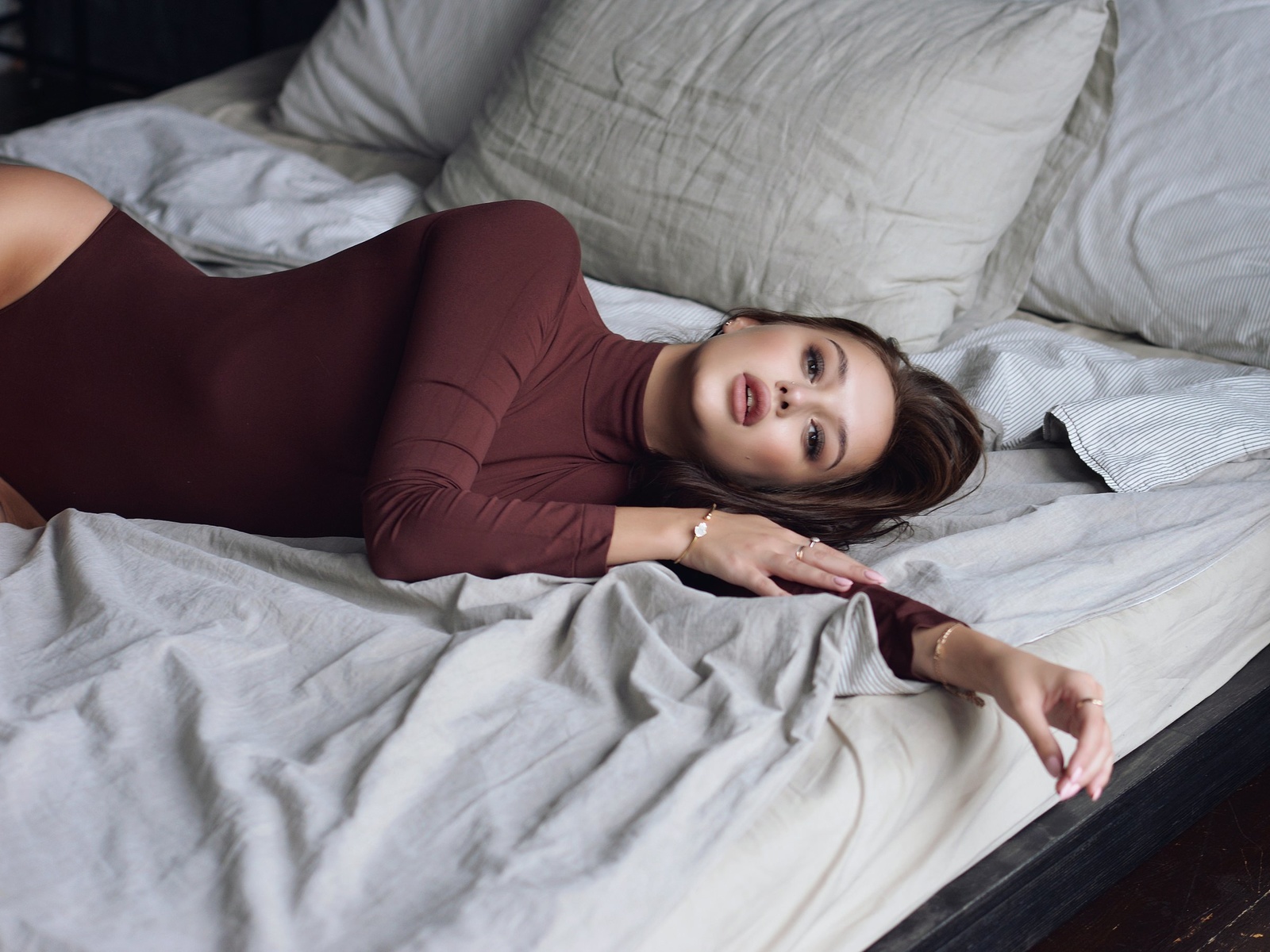 women, brunette, leotard, pillow, pierced nose, in bed, pink nails, ribs, brown eyes, pink lipstick, hips