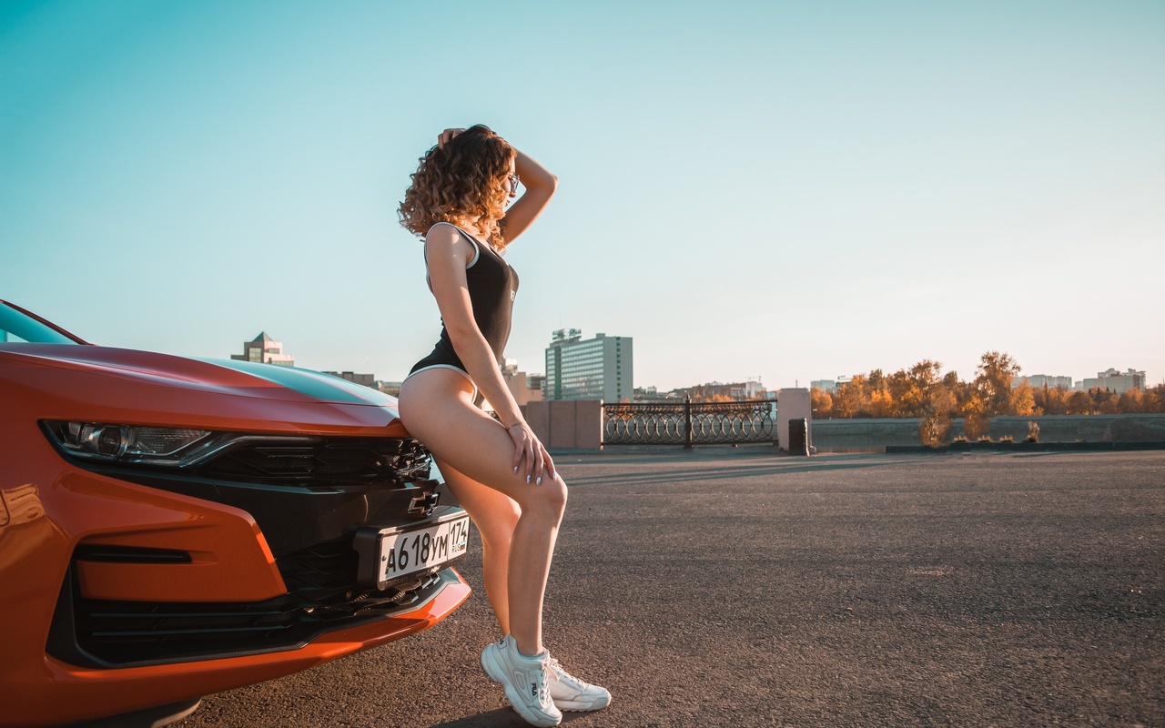 women, women with cars, ass, sneakers, fila, bodysuit, curly hair, women with glasses, sky, building, women outdoors, chevrolet