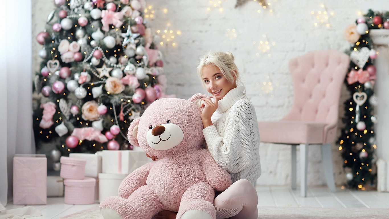 women, katerina shiriaeva, brunette, blonde, hairbun, katerina shiryaeva, christmas tree, christmas, women indoors, presents, sitting, smiling, teddy bears, chair, wall, bricks, white sweater, wooden floor, dmitry arhar, ,  