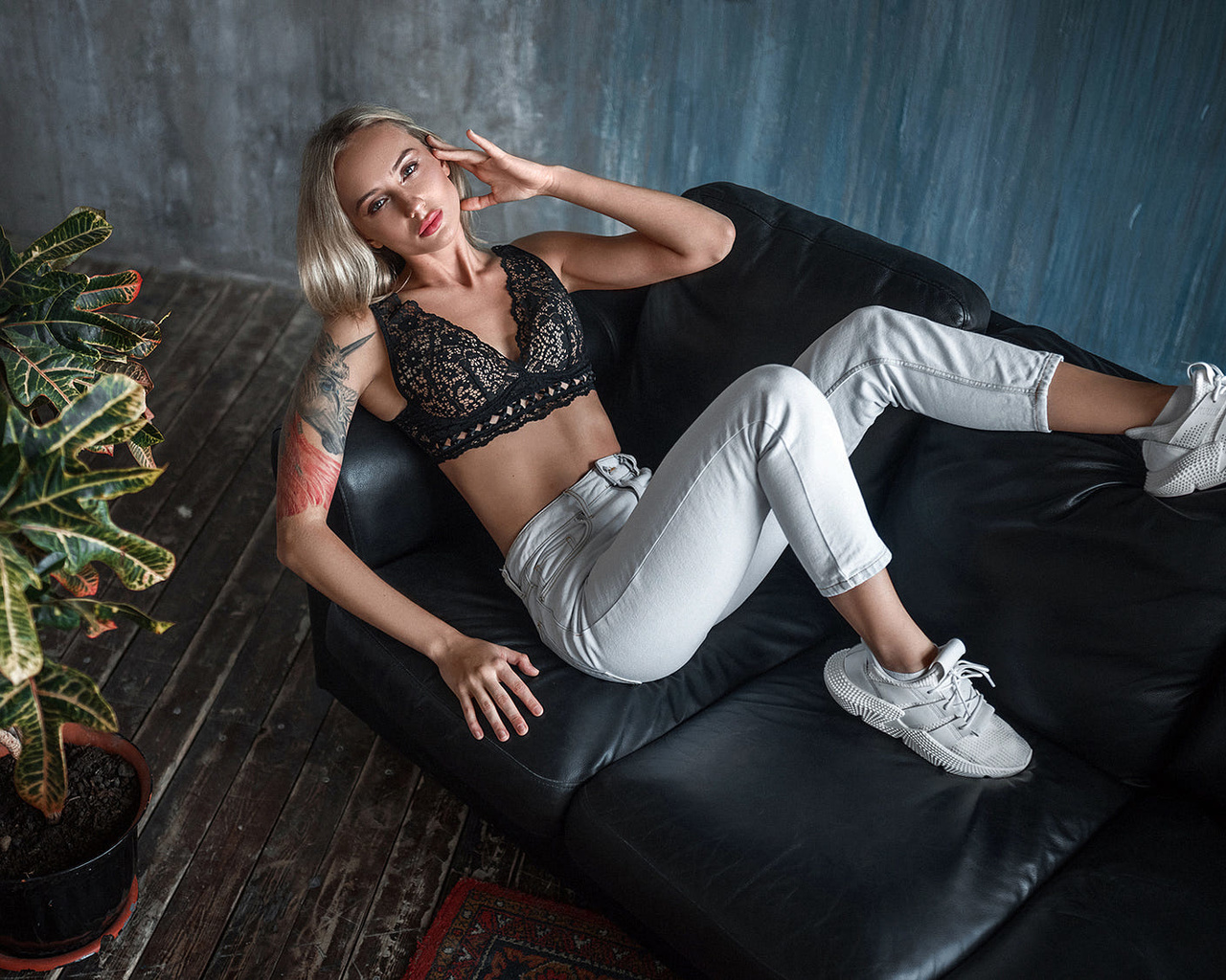 women, blonde, top view, couch, wall, wooden floor, plants, tattoo, sneakers, pants, cleavage, brunette, women indoors