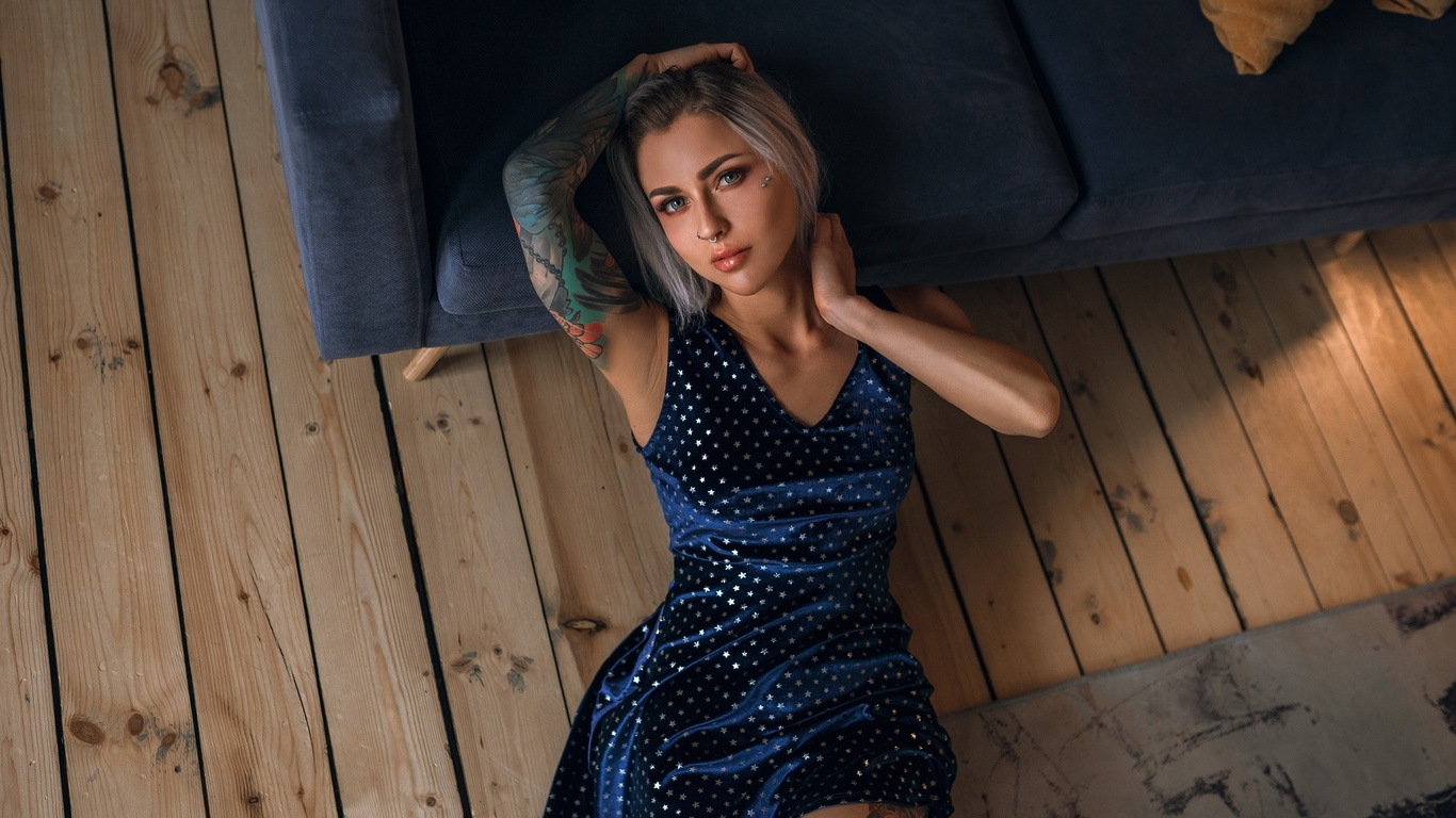 women, blue dress, brunette, tattoo, wooden floor, women indoors, blue couch, nose ring, top view, gray eyes, dyed hair