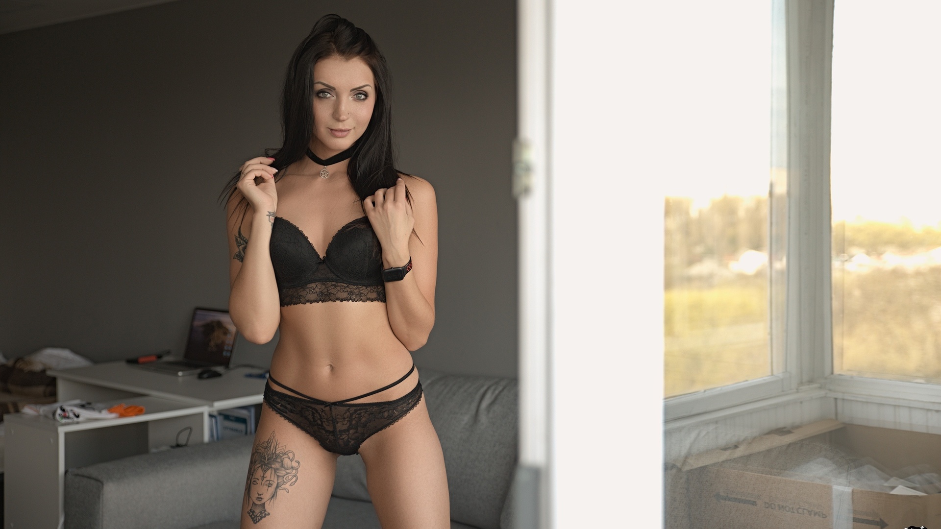 women, brunette, black lingerie, couch, tattoo, belly, smiling, cleavage, desk, laptop, watch, pierced nose, women indoors