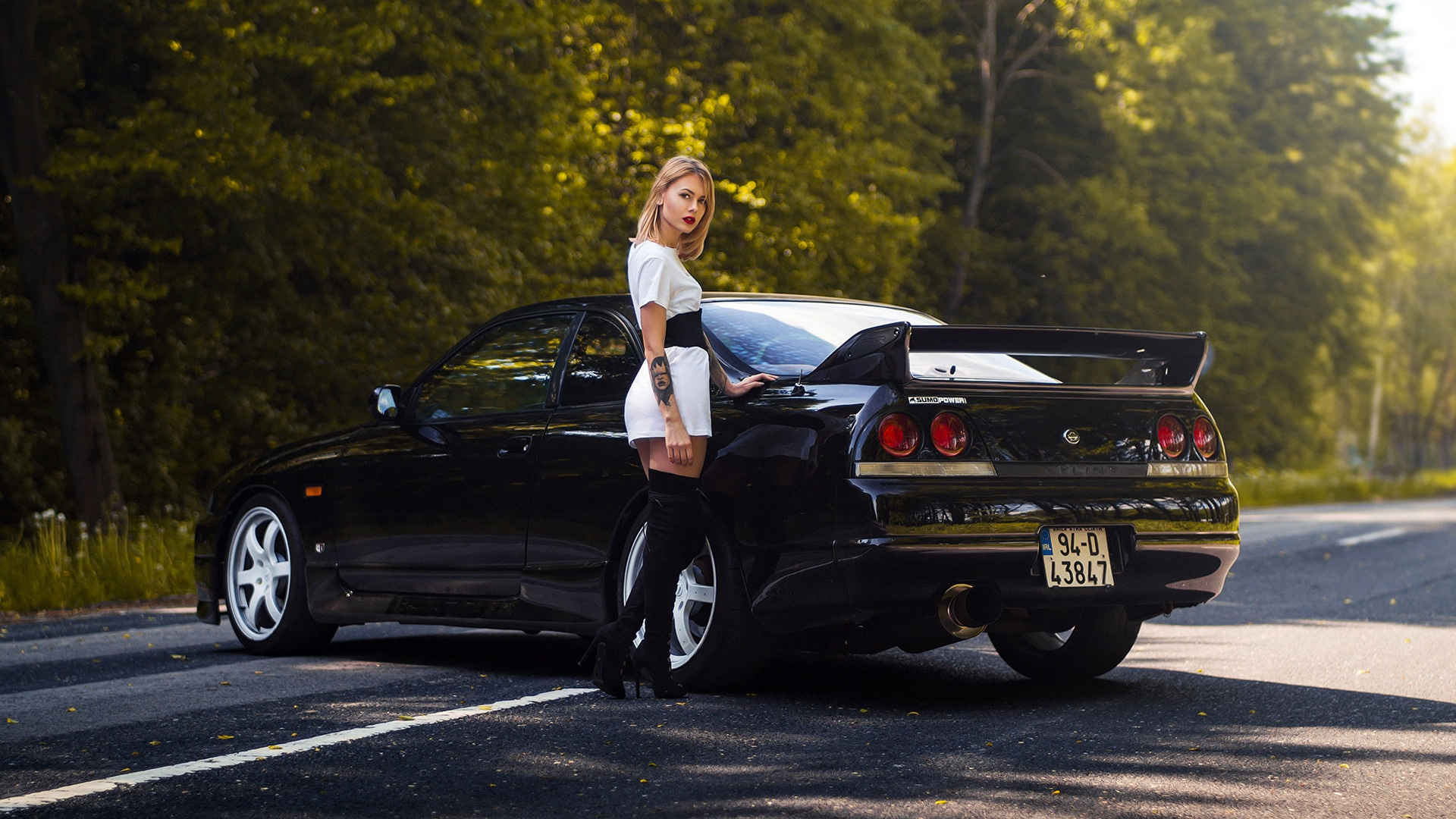 nissan skyline, r34, girl, women, city, black car, blonde, street, dress, tattoo, road