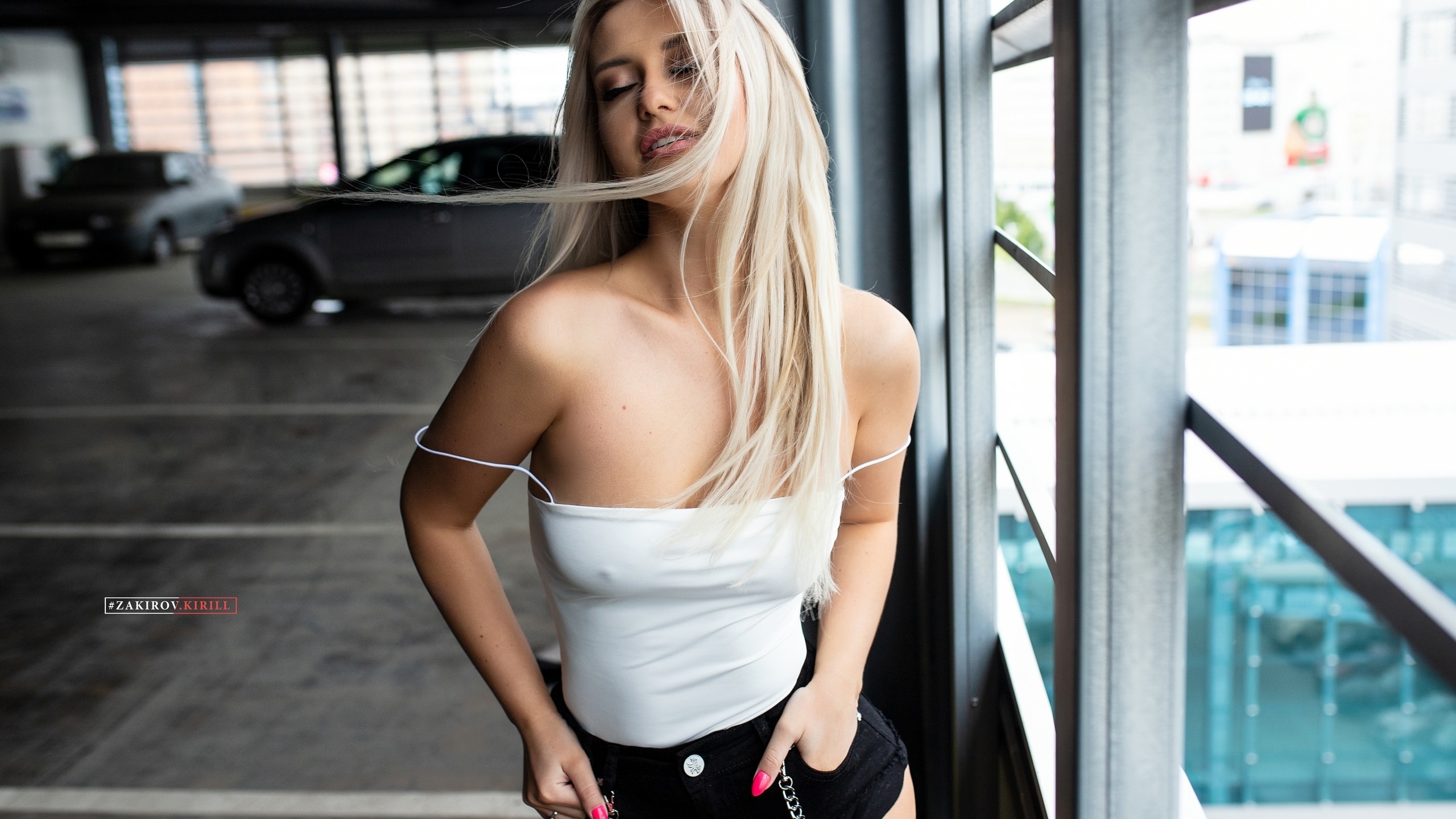 women, blonde, car, women indoors, closed eyes, nipples through clothing, jean shorts, brunette, kirill zakirov, hair in face, bare shoulders, parking lot