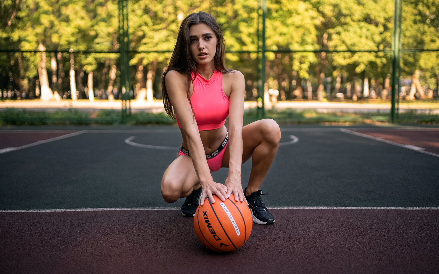 women, basketball court, sportswear, ball, women outdoors, sneakers, trees, squatting, belly, brunette