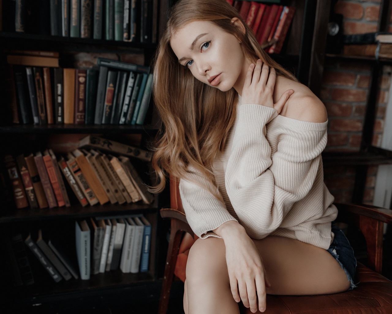 women, andrey popenko, books, sitting, women indoors, jean shorts, sweater, chair, eyeliner