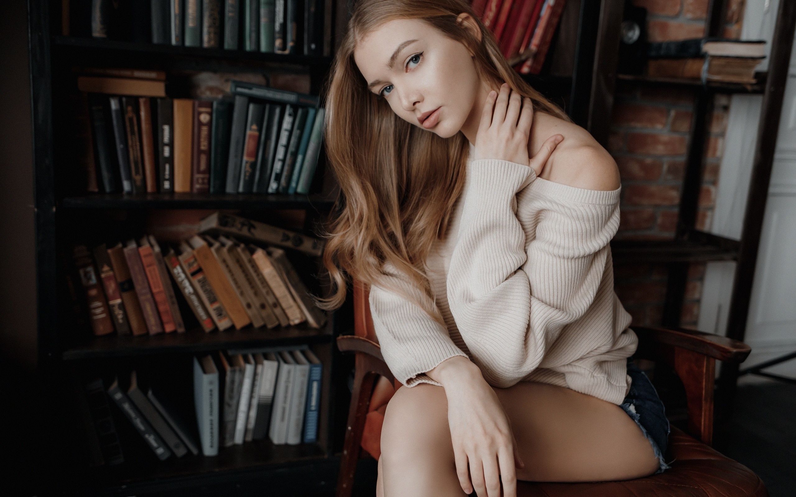 women, andrey popenko, books, sitting, women indoors, jean shorts, sweater, chair, eyeliner