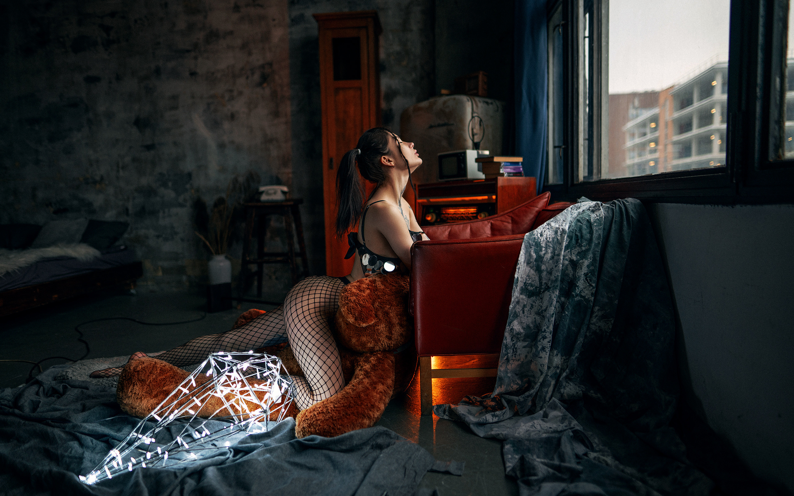 anastasia milkovich, women, fishnet, teddy bears, women indoors, tattoo, ass, closed eyes, ponytail, window, armchair, bed, pillow, black hair, books, bra, lingerie