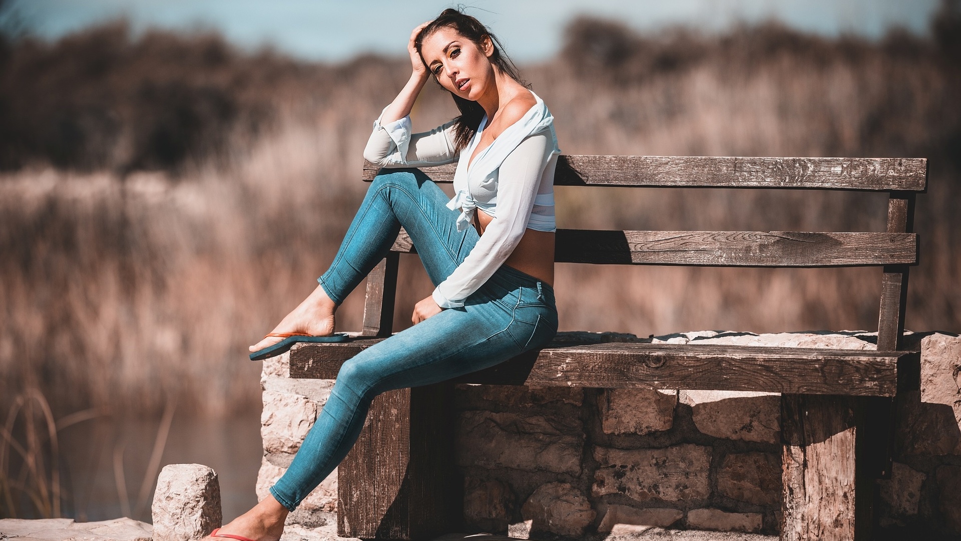 patrik valasek, model, brunette, jeans, women, short tops, short tops, flip flops, clouds, bench, sitting, women outdoors