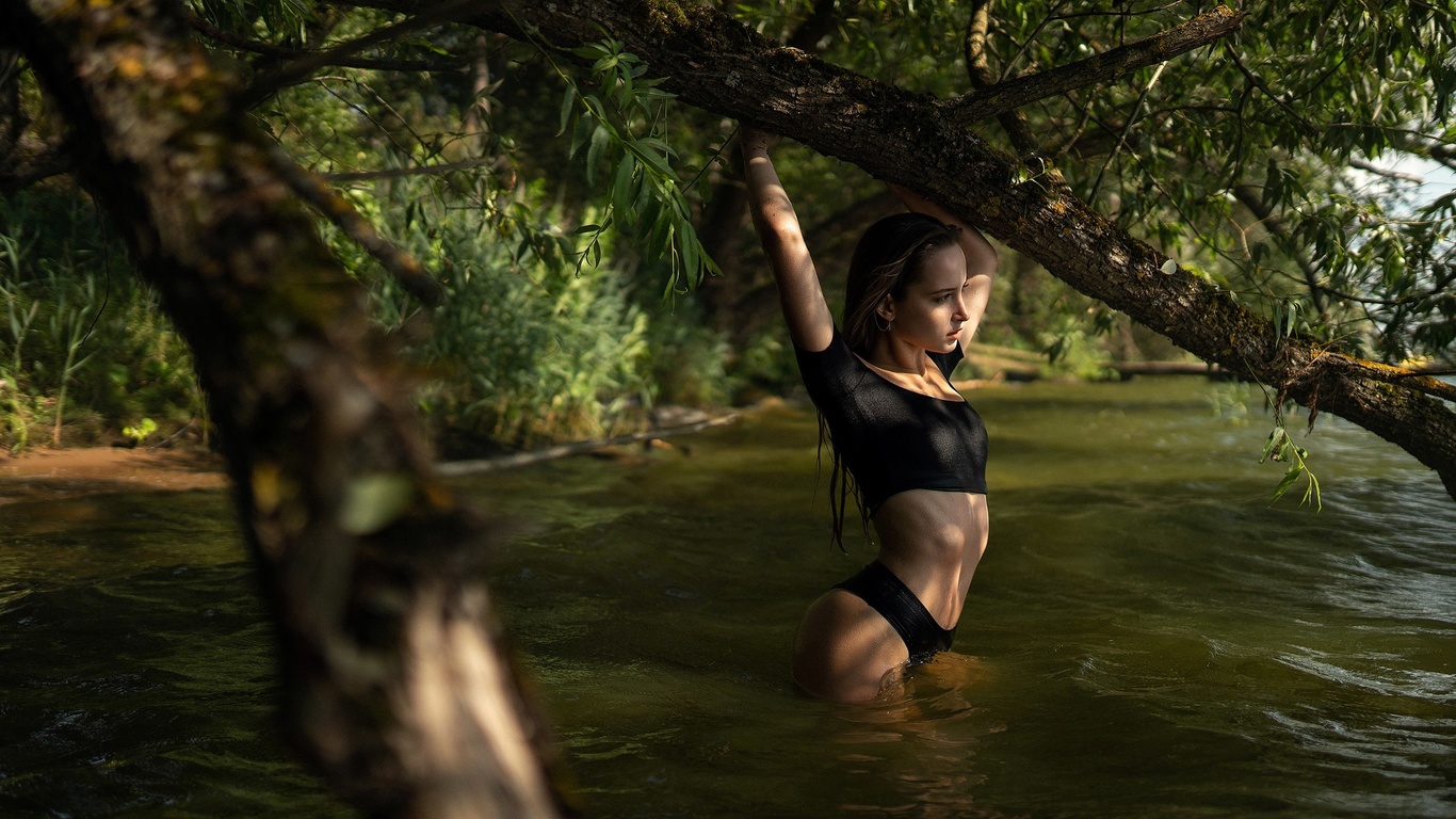 women, river, brunette, trees, women outdoors, wet body, black clothing, wet hair, arms up, ribs, belly