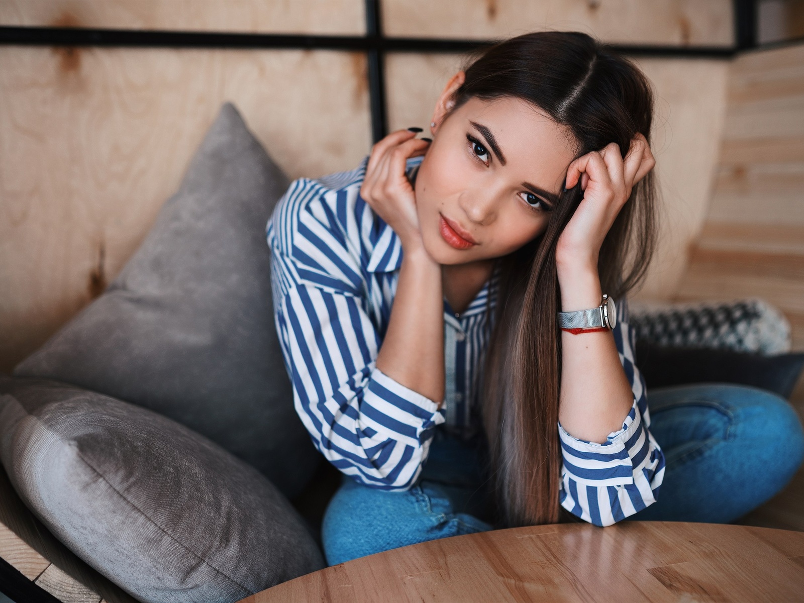 women, model, brunette, women indoors, asian, jeans, striped shirt, couch, table, watch, sitting