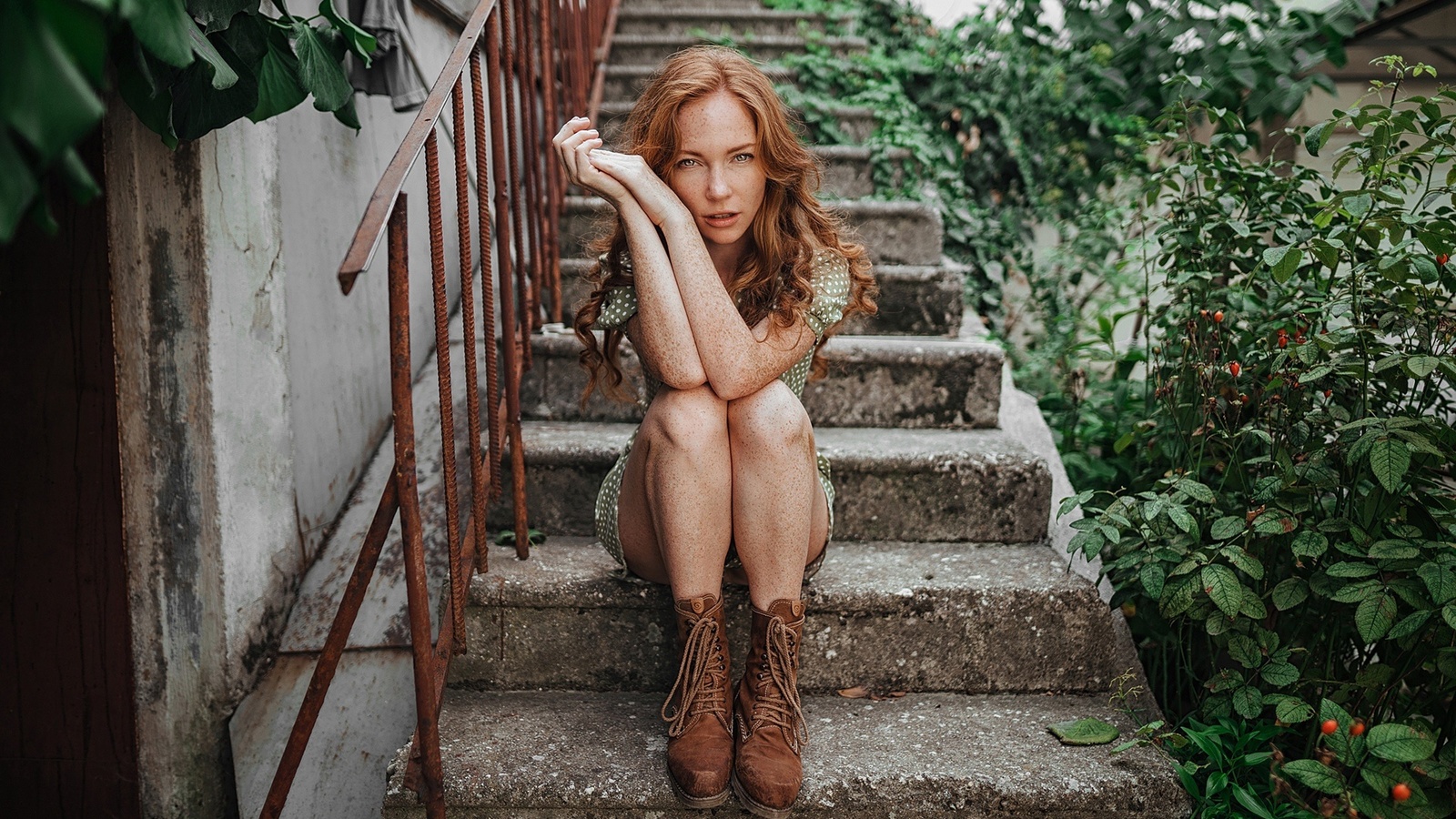 sergey freyer, women, model, redhead, women outdoors, sitting, green dress, dress, stairs, boots, plants, freckles