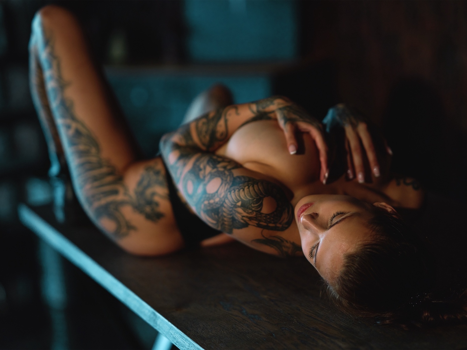 evgenia talanina, women, model, brunette, women indoors, lying on back, table, black panties, panties, thong, black thong, ass, tattoo, no bra, closed eyes, big boobs