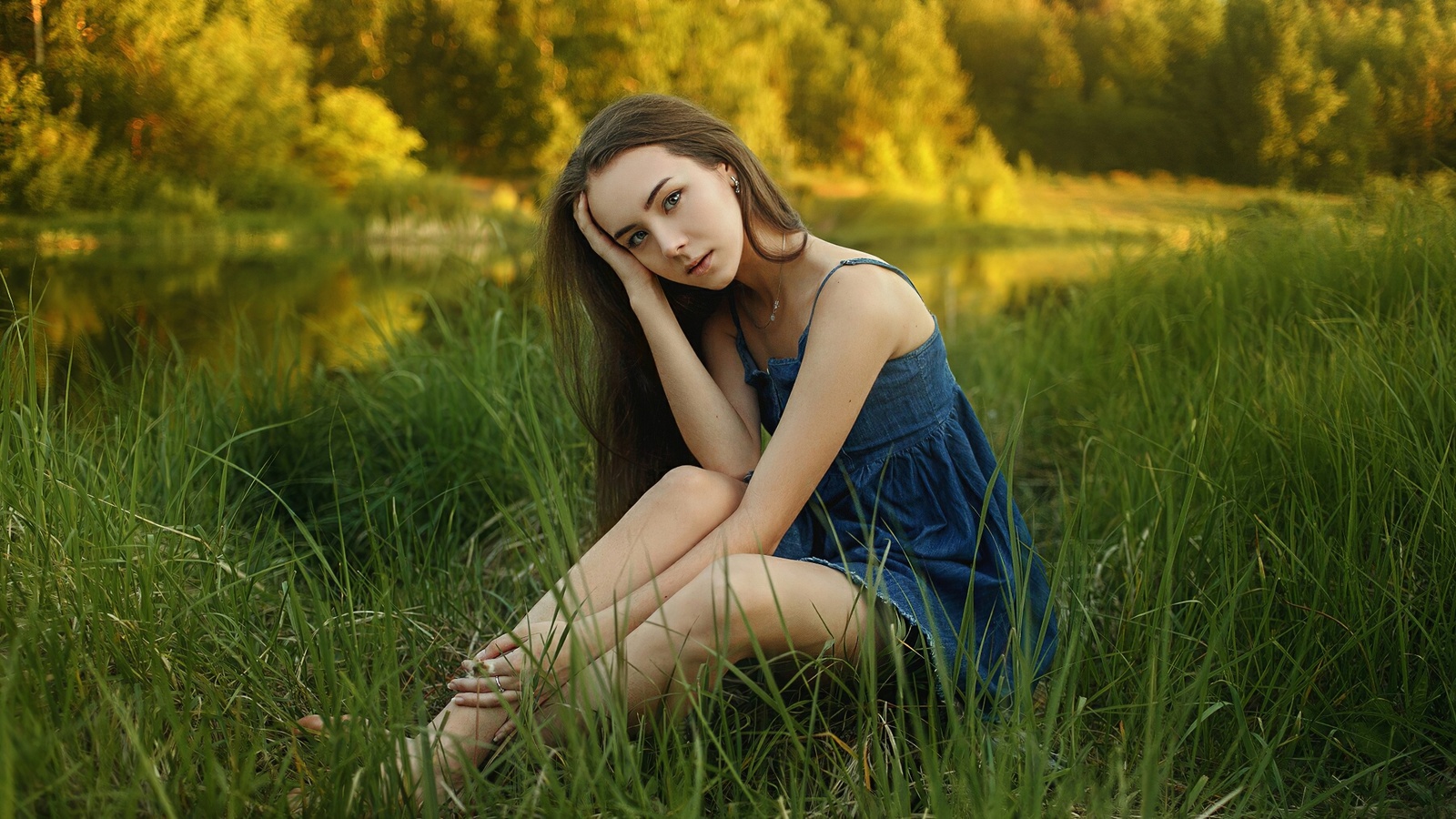 women, brunette, model, women outdoors, denim dress, dress, sitting, grass, nature, trees