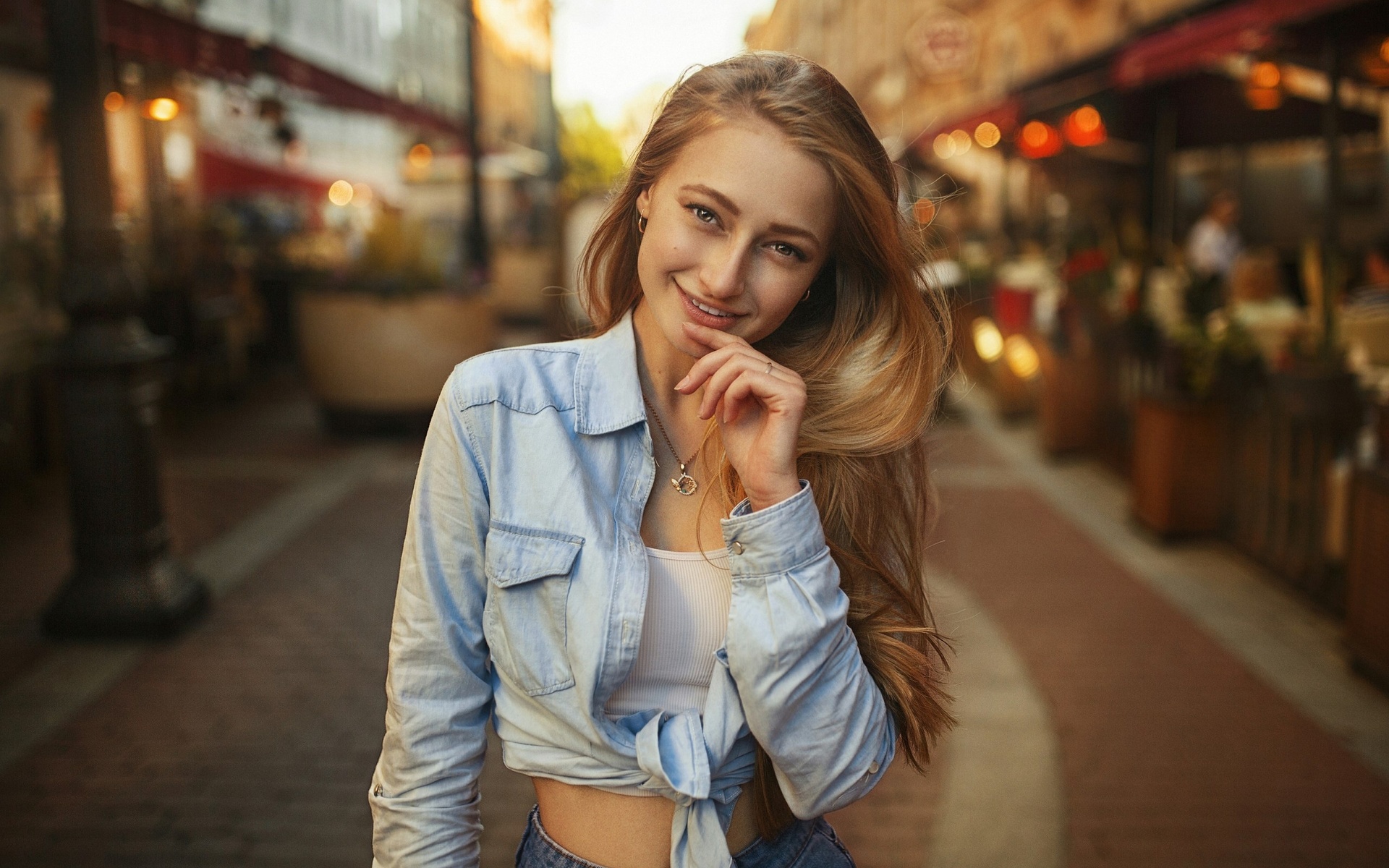 girl, public, blonde, women outdoors, model, women, long hair, white tops, shirt, jeans, smiling, urban, looking at viewer