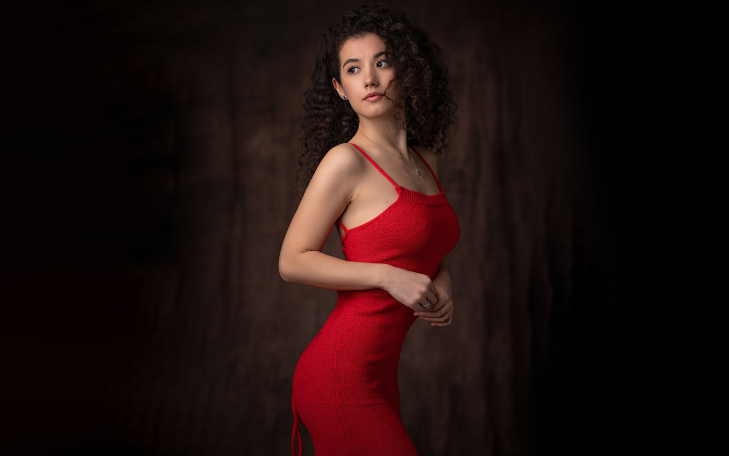red dress, , studio, model, tight dress, curly hair, women, simple background, women indoors, , hips, brunette, looking away, wavy hair